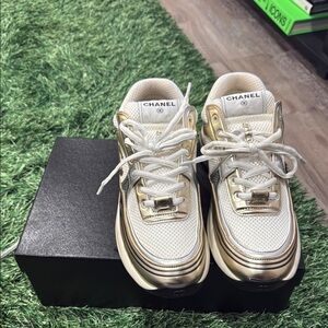 CHANEL Metallic Gold and White Sneakers
